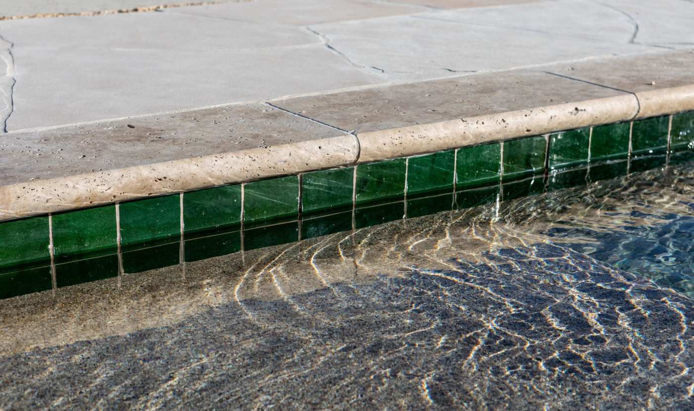 a green tiled pool.