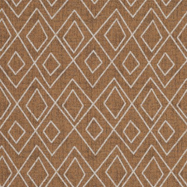 Brown woven rug with repeating white double-diamond outlines, lying flat and covering a floor; even diffuse lighting highlights its textured, symmetrical pattern, no furniture visible.