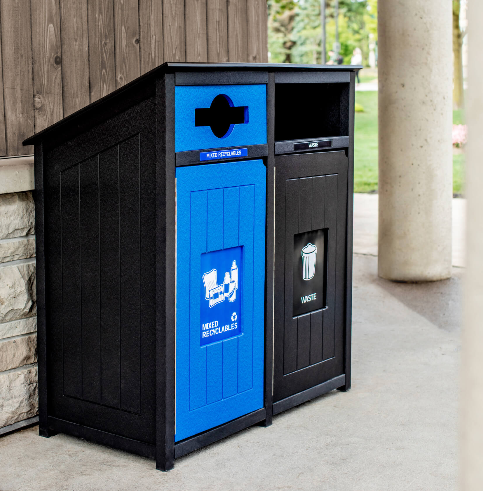 double recycling and waste container outside at a city park