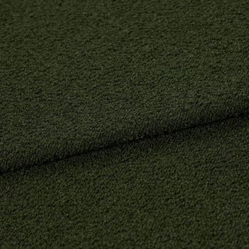 Dark oliveâ€‘green bouclÃ© fabric, folded in a shallow horizontal overlap, showing dense looped texture; close-up studio view emphasizing a tactile, slightly shadowed surface.