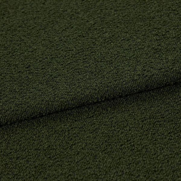 Dark olive‑green bouclé fabric, folded in a shallow horizontal overlap, showing dense looped texture; close-up studio view emphasizing a tactile, slightly shadowed surface.