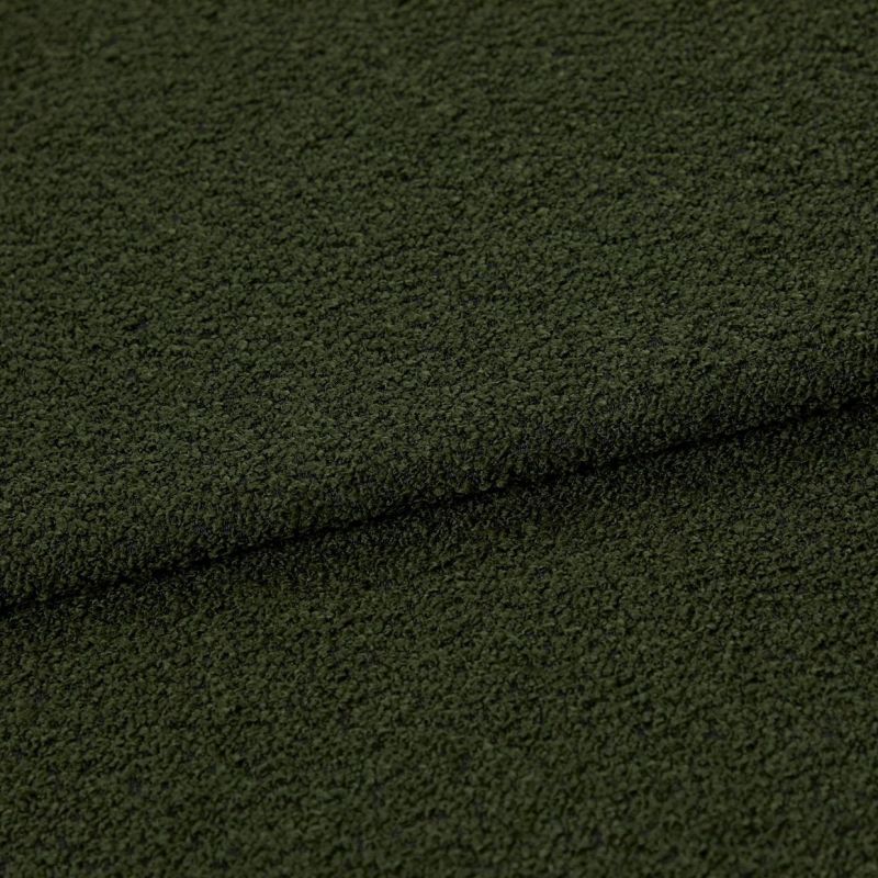 Dark olive‑green bouclé fabric, folded in a shallow horizontal overlap, showing dense looped texture; close-up studio view emphasizing a tactile, slightly shadowed surface.