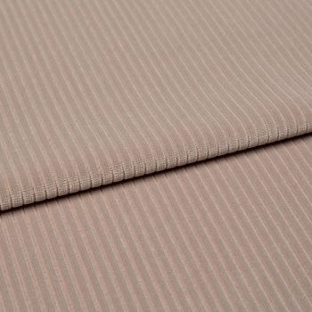 Ribbed beige corduroy fabric, folded into two layered panels showing parallel ridges, photographed close-up on a neutral surface with soft, even studio lighting.