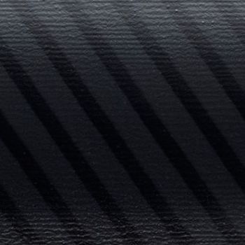Venetian blind slats casting diagonal dark stripes across a textured black surface, filtering soft light in a dim, close-up scene with subtle grain and low contrast.