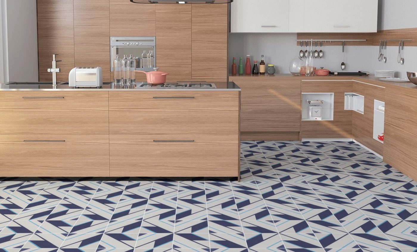 a kitchen with a blue and white tile floor.