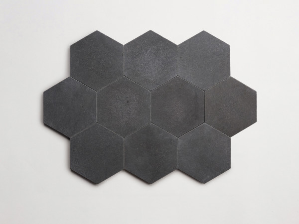 lapidary: girata | hex | warm black | tumbled 
