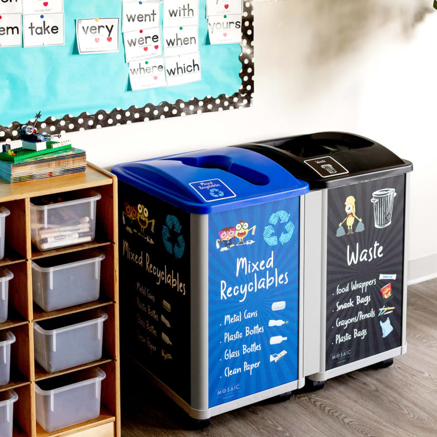 kid friendly waste and recycling containers in an elementary school classroom with fun signs and labels