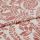 Cream fabric printed with terracotta botanical and pomegranate motifs, folded and overlapped to show pattern repeat, close-up on a flat surface under soft, even studio lighting.