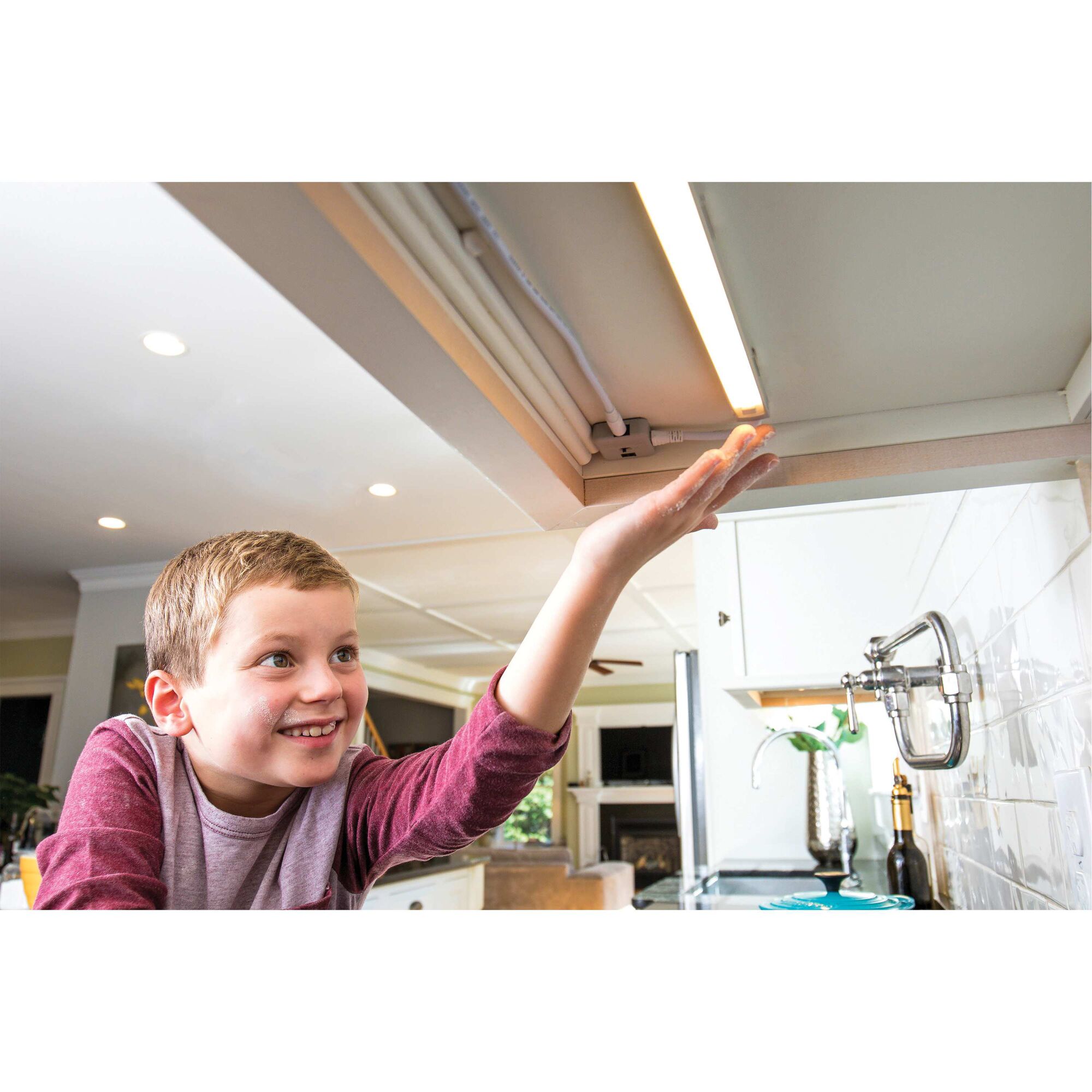 Motion sensor to turn 1 BAR L E D UNDER CABINET LIGHTING KIT on or off in use by a kid.