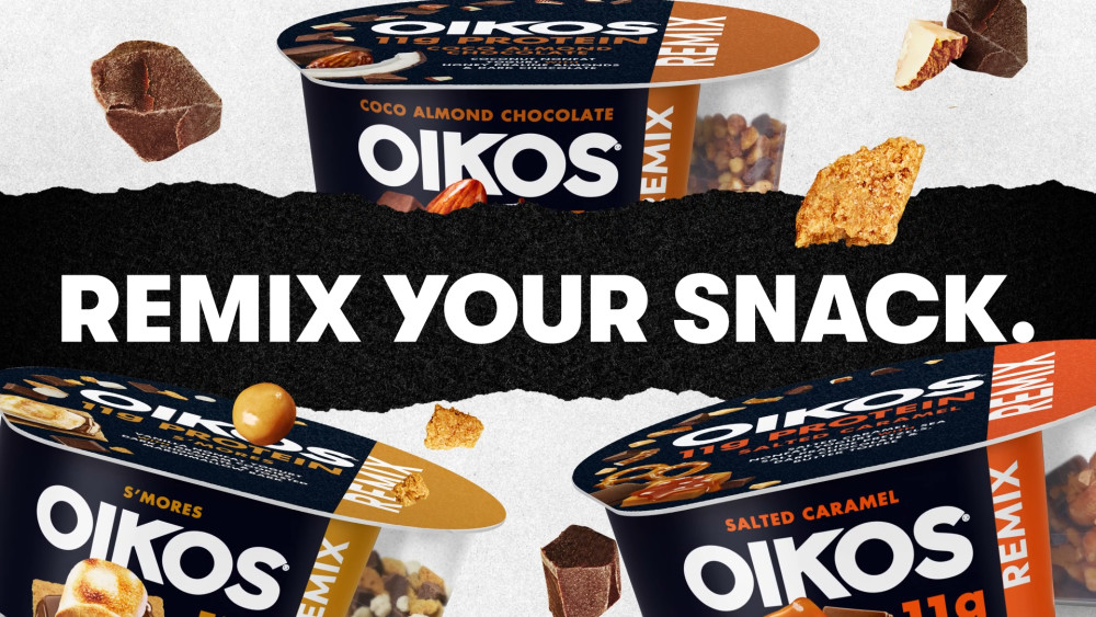 thumbnail video image 2 of Oikos REMIX S’mores 11g Protein, Vanilla Fat Free Greek Yogurt Cup with Graham Cookies, Dark Chocolate and Toasted Marshmallow Bark Mix-Ins, 4.5 oz, 2 of 14