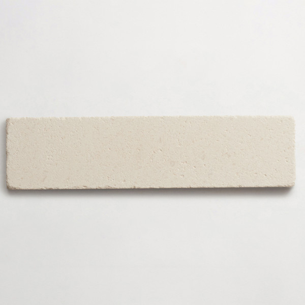 lapidary: girata | blade | white limestone | tumbled 