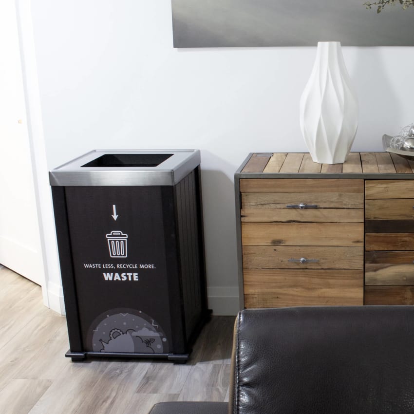 black waste container with a body sign in an office space