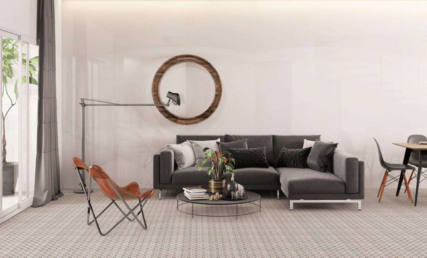 a modern living room with a tile floor and a black couch.