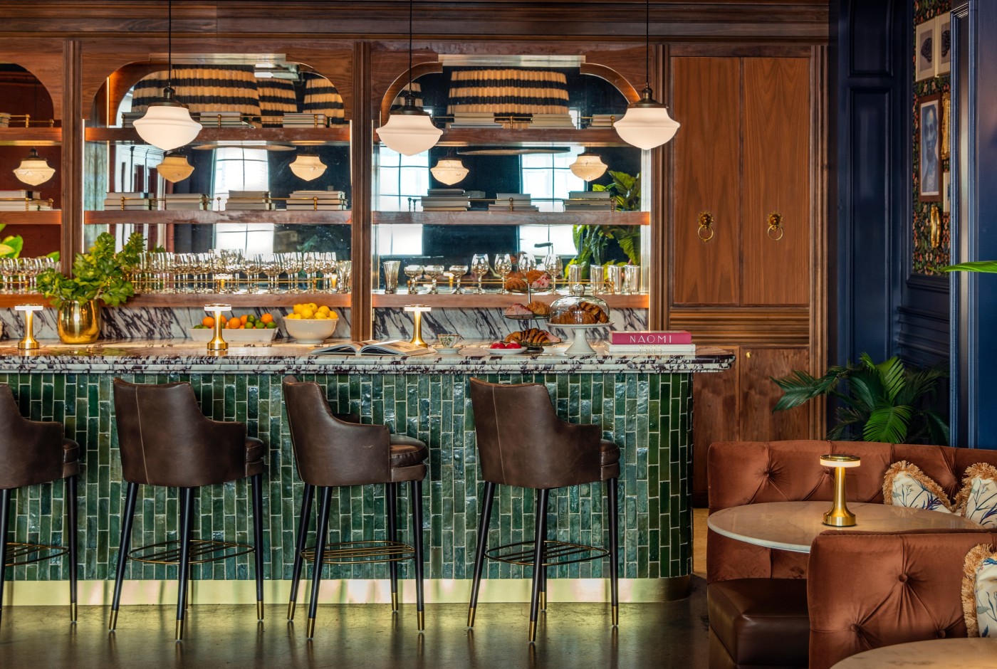 a green tiled bar in a restaurant.