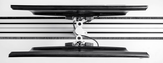 The cleanest solution for shared workspaces with dual monitors on opposing sides.