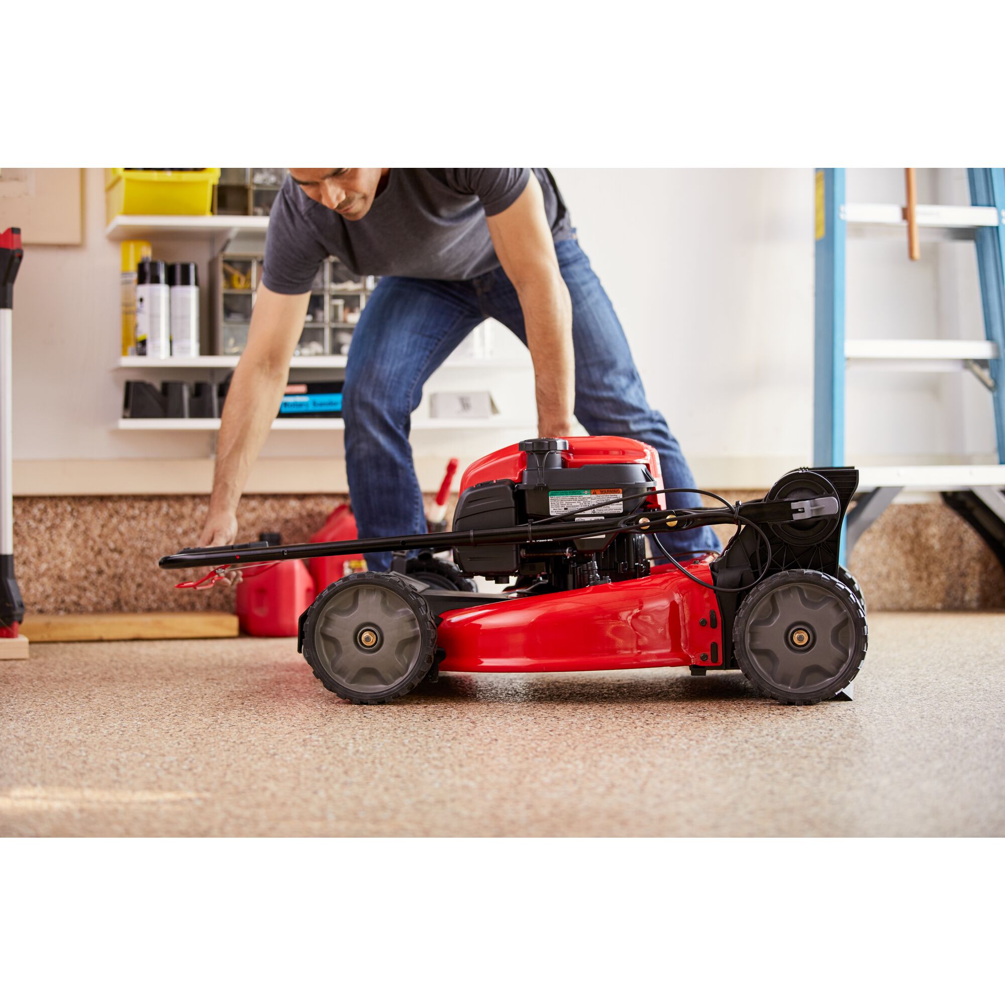 CRAFTSMAN M260 21-IN.163cc Fwd Self-Propelled Mower handles folded over preparing for vertical storage