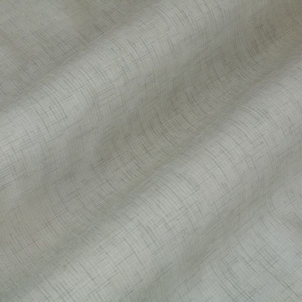 Light gray textured curtain fabric with fine crosshatch pattern, draped in soft vertical folds, gently diffusing light; close-up interior view emphasizing weave and subtle shading.