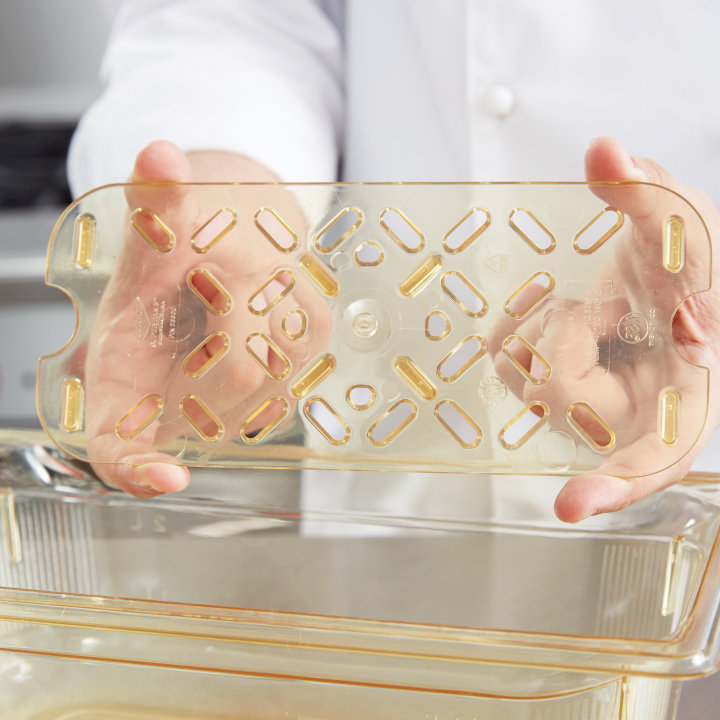 Third-size Super Pan® high-temperature plastic false bottom in amber