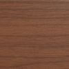 Horizontal walnut veneer panel filling the frame, displaying fine straight grain and subtle sheen; resting flat as a tabletop or shelf surface in soft, even indoor lighting.