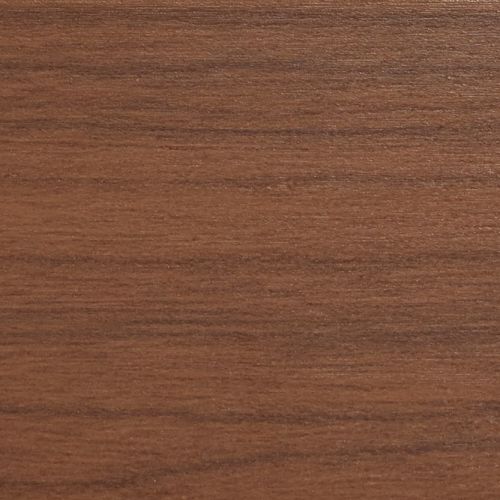 Horizontal walnut veneer panel filling the frame, displaying fine straight grain and subtle sheen; resting flat as a tabletop or shelf surface in soft, even indoor lighting.