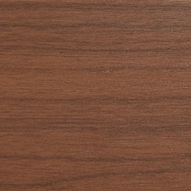 Horizontal walnut veneer panel filling the frame, displaying fine straight grain and subtle sheen; resting flat as a tabletop or shelf surface in soft, even indoor lighting.