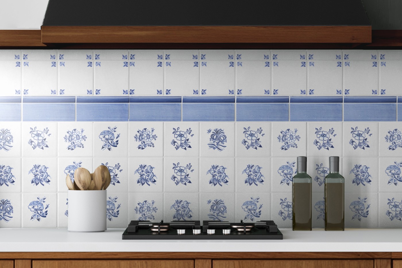 a kitchen with a stove backsplash composed of blue and white tiles.