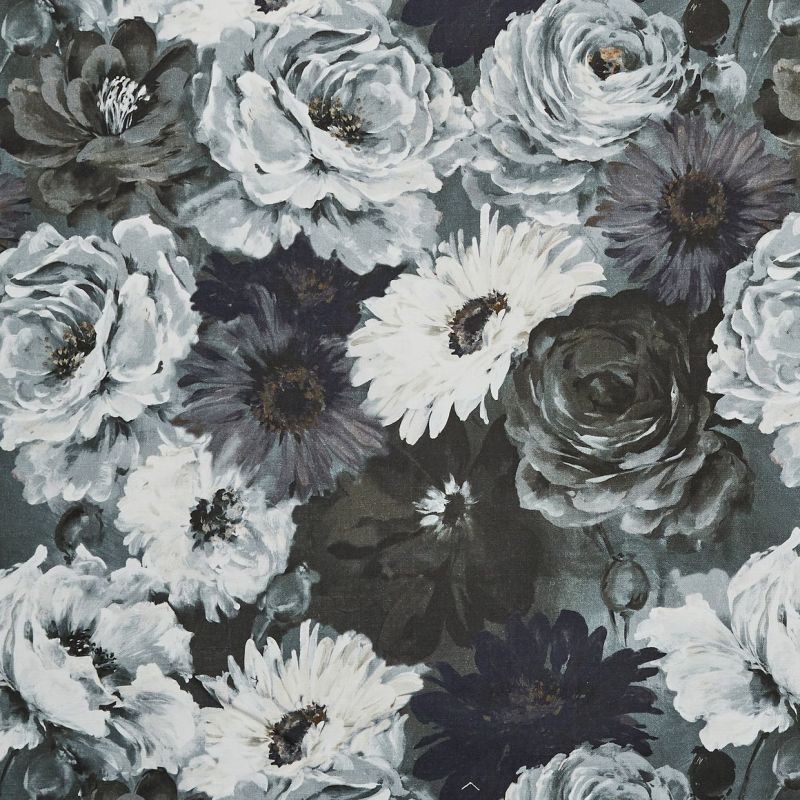 A dense floral fabric/wallpaper print of painted roses and daisies, large overlapping blooms in muted blues, grays, and whites; the pattern covers a flat surface under soft, even lighting.
