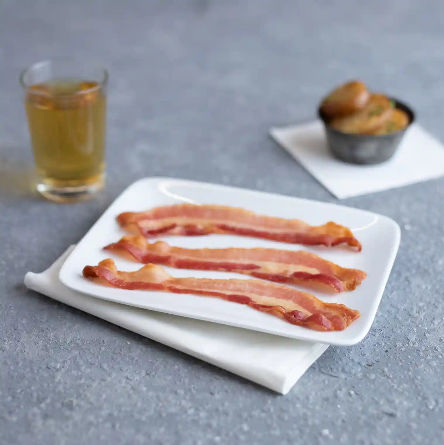 Wright® Brand Naturally Applewood Smoked Thick Sliced Flat-Pack® Bacon, 15 lbs, 10-14 Slices per Pound, Gas Flushed https://images.salsify.com/image/upload/s--2V-0D_4N--/q_25/hew505v9t3vvljqatkbb.webp