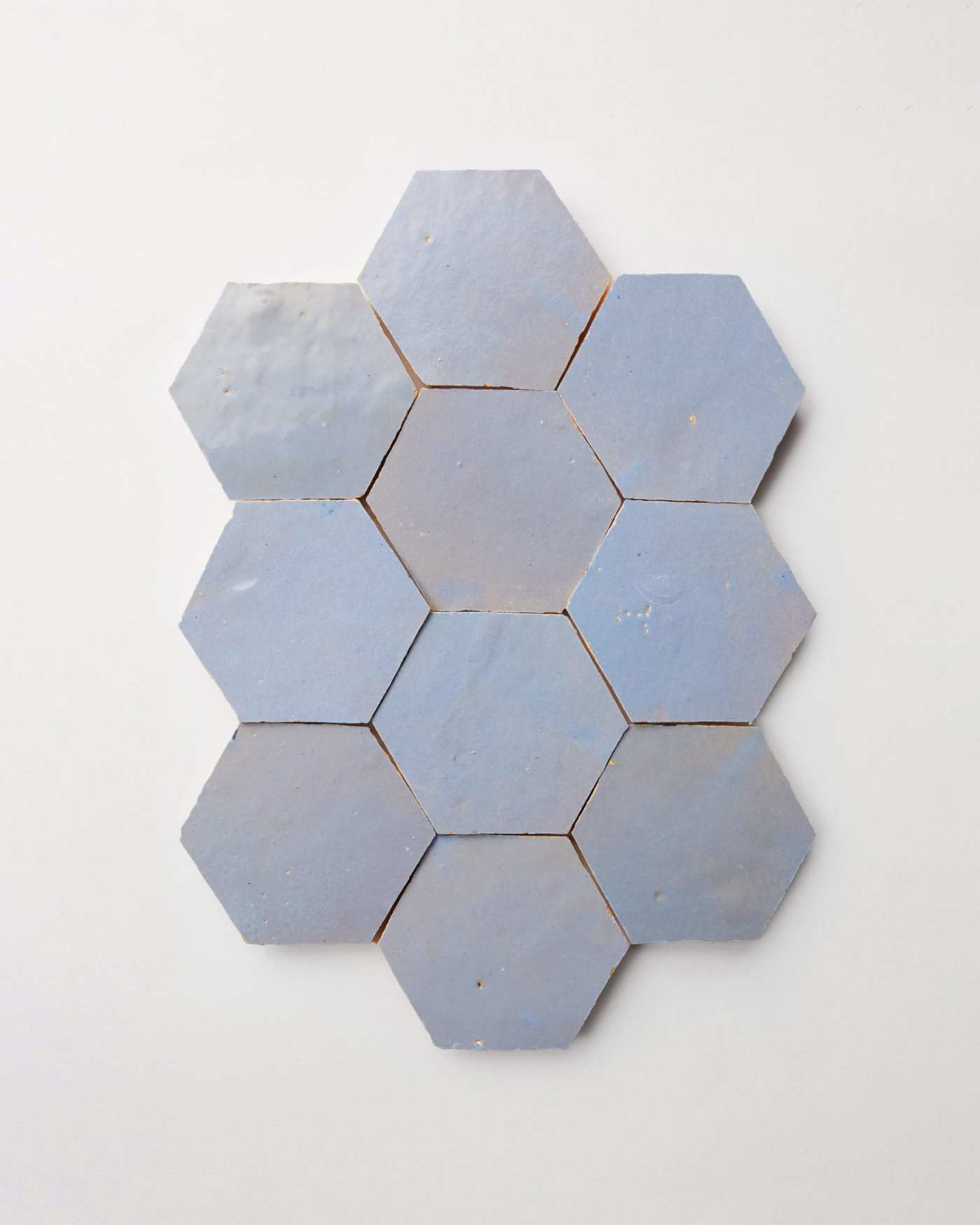 blue hexagon tiles on a white background.