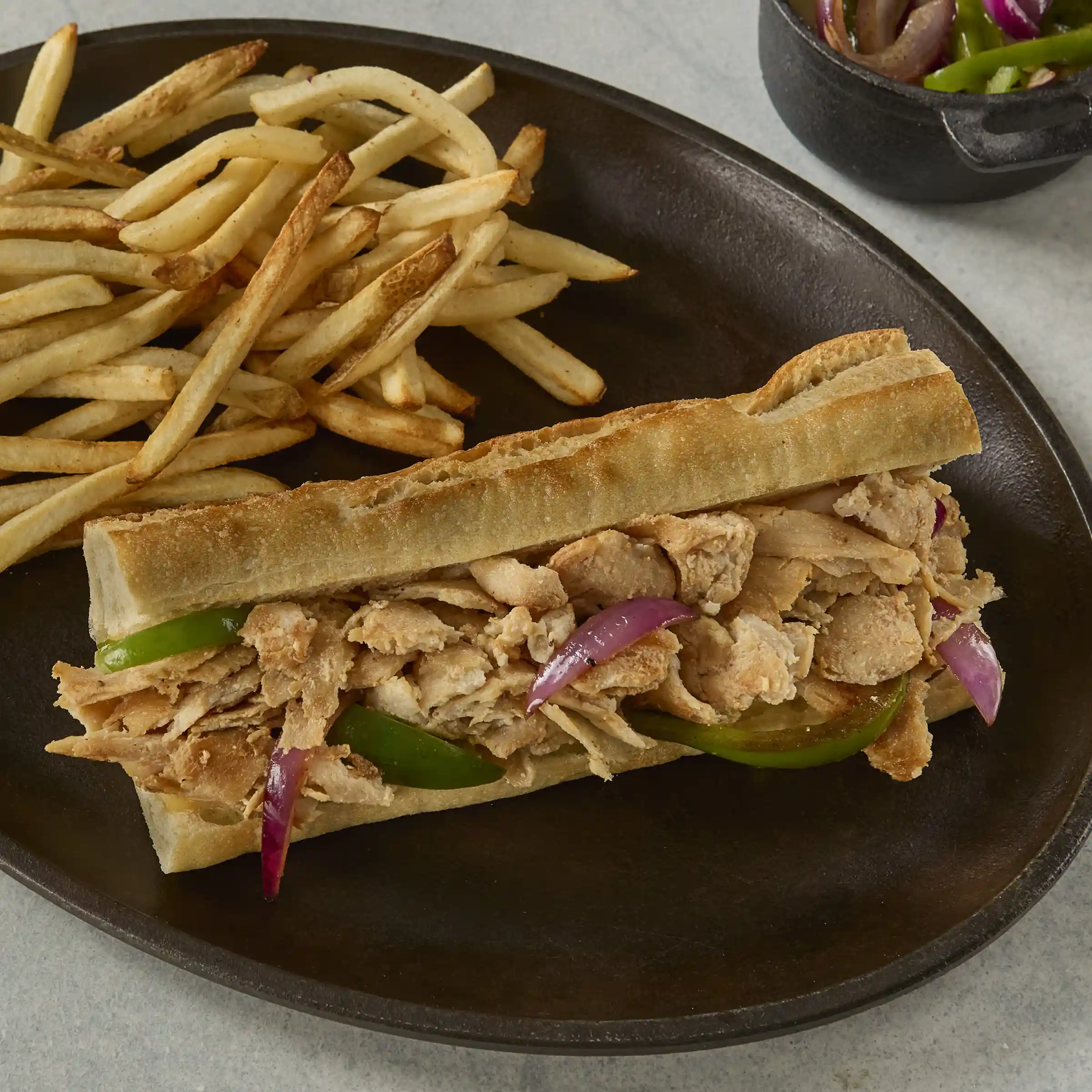 Original Philly® Chicken Sandwich Slices https://images.salsify.com/image/upload/s--emCjn3QM--/q_25/a064b981f88729d78efa0c7dfe88c03279d1e4bf.webp