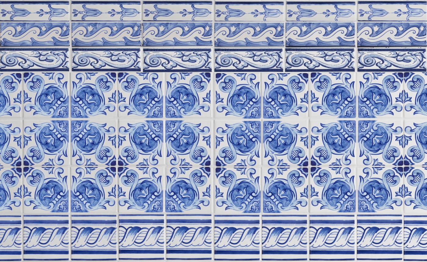 blue and white delft tiles with decorative designs.