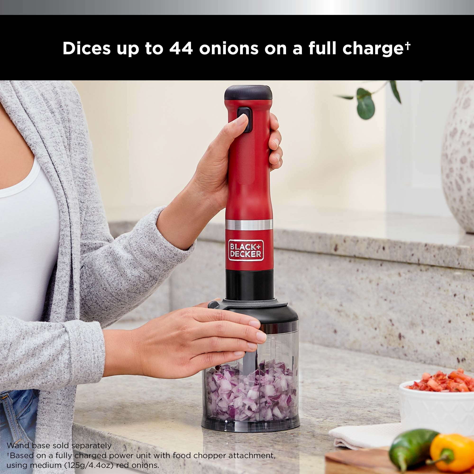The BLACK+DECKER kitchen wand™ food chopper attachment can duce up to 44 onions on a full charge, talent showing attachment with the red wand base