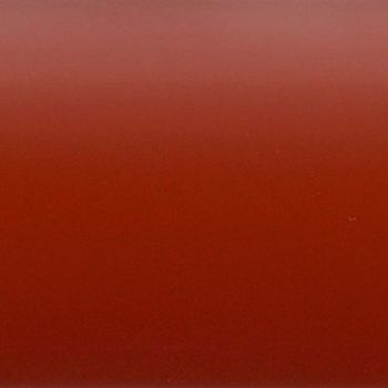 Glossy red panel, smooth and unadorned, displaying a subtle vertical gradient from darker at bottom to lighter at top and faint tiny speckles; close-up, evenly lit, minimal composition.
