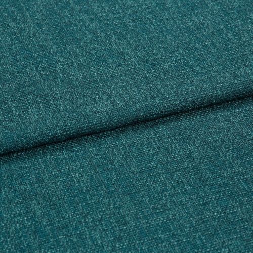 Teal woven upholstery fabric, close-up of a folded seam showing textured boucle-like weave; the fabric is folded diagonally across the frame, lit evenly in soft studio lighting.
