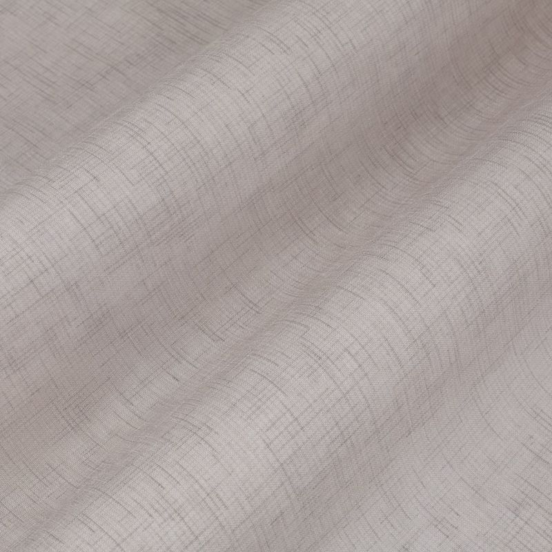 Sheer textured curtain fabric, light beige with a subtle crosshatch weave; draped in soft undulating folds; close-up view with diffuse, neutral lighting and no visible surroundings.