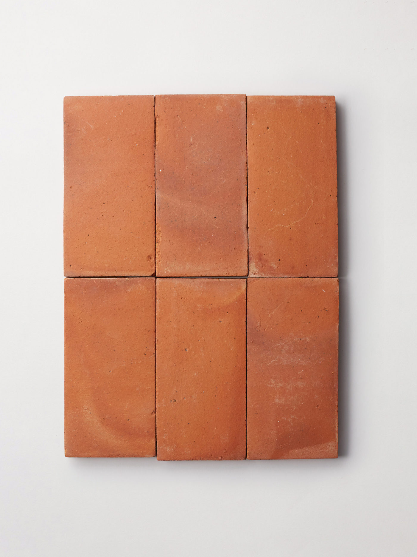 6 rectangular red clay tiles on a white background.