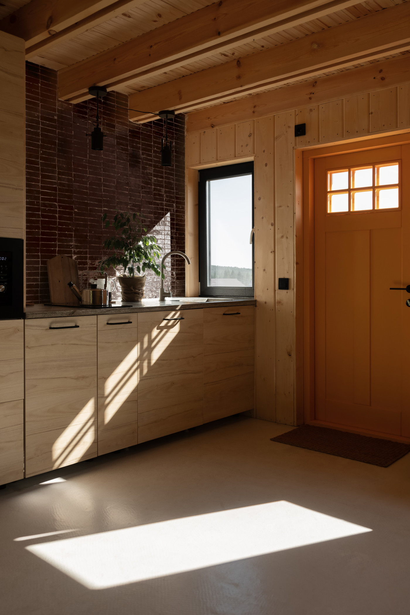 a kitchen with a window and a sink.