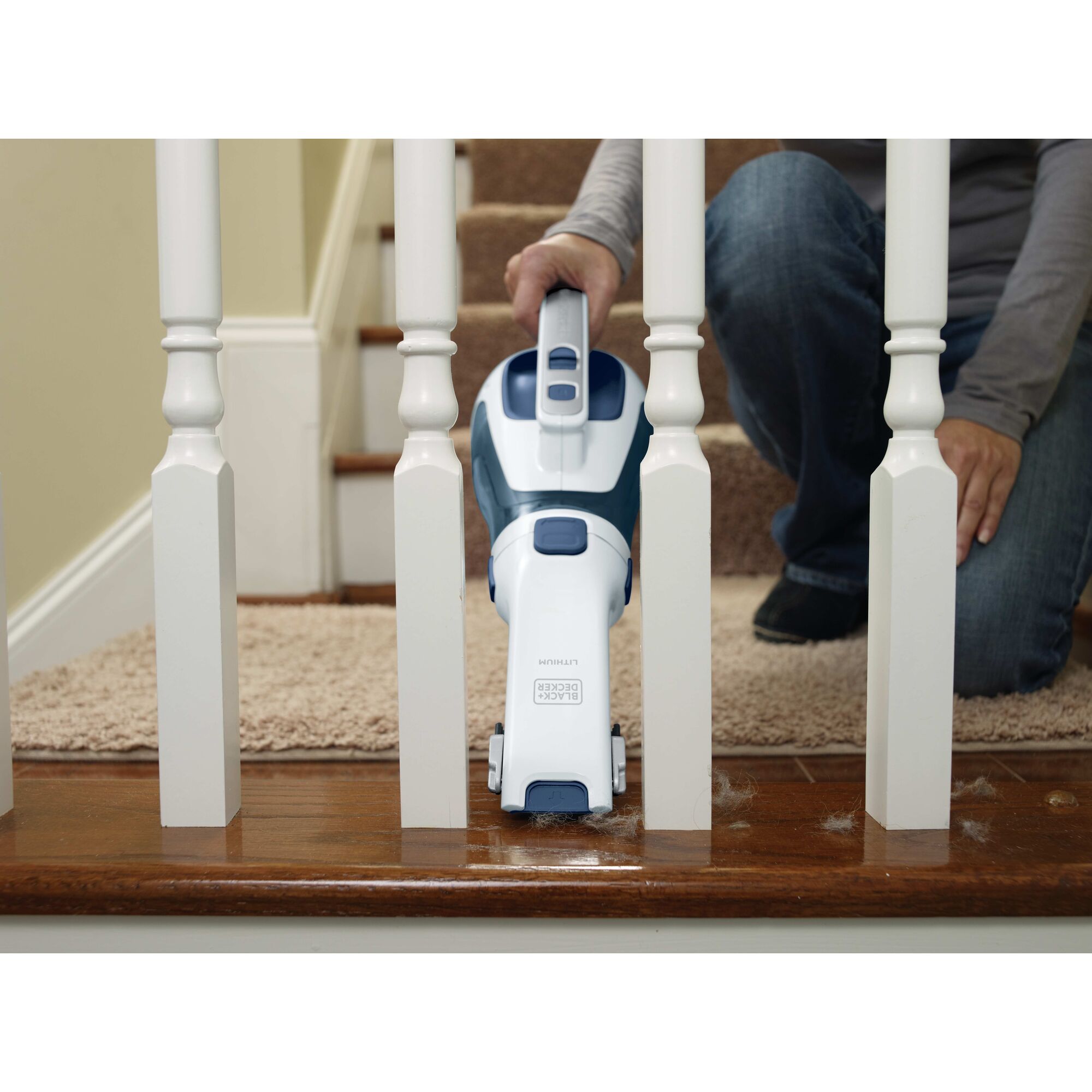dustbuster Cordless Hand Vacuum being used to collect fur from floor.
