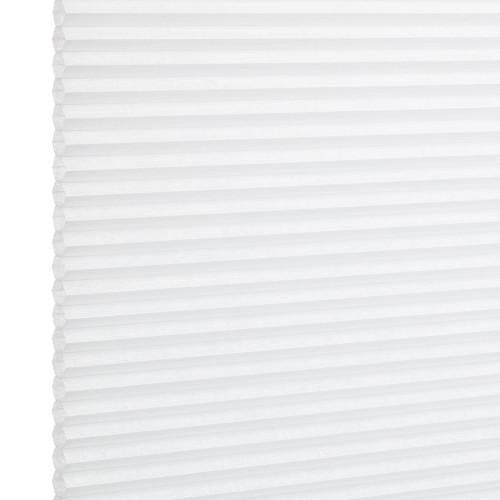 White pleated cellular window shade, fully lowered and closed with regular horizontal honeycomb cells; filtering diffuse light in a bright, minimal interior setting.