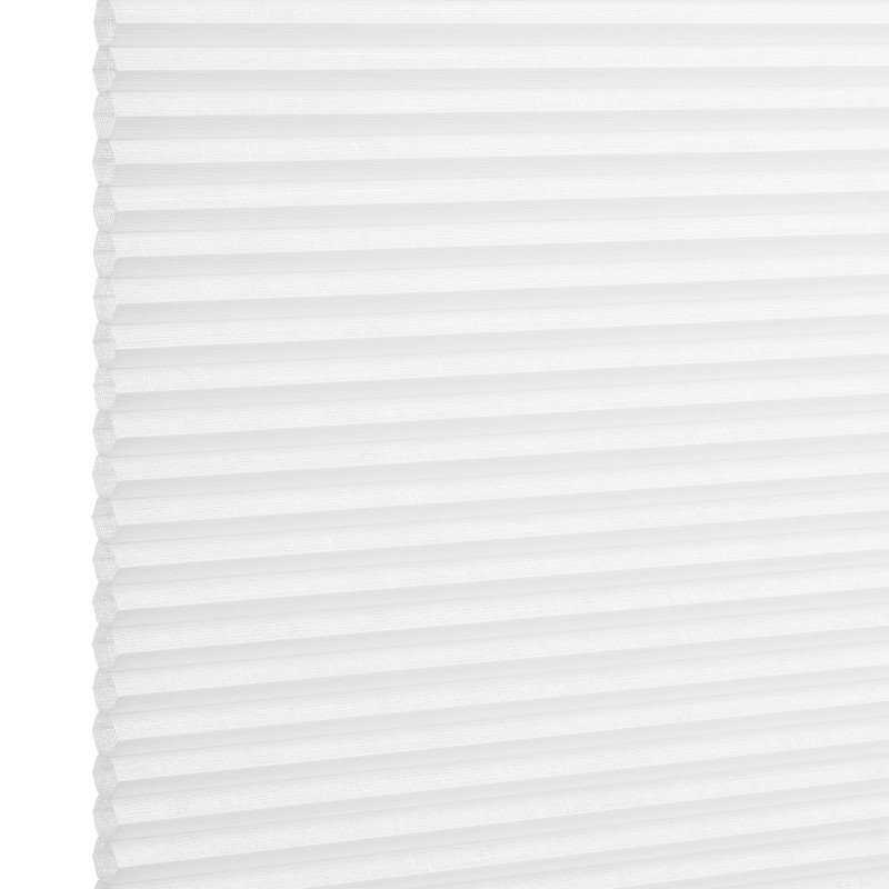 White pleated cellular window shade, fully lowered and closed with regular horizontal honeycomb cells; filtering diffuse light in a bright, minimal interior setting.