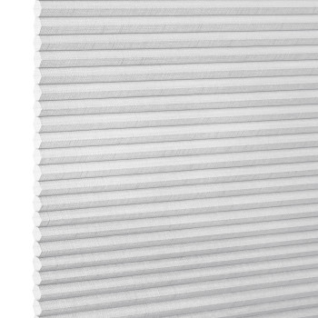 White honeycomb cellular shade, fully lowered with horizontal pleats and subtle linen texture; closed, diffusing soft light; fills a bright interior window opening, neutral minimalist room lighting.