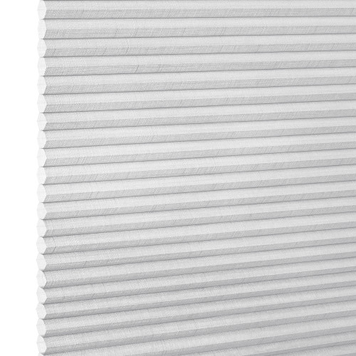 White honeycomb cellular shade, fully lowered with horizontal pleats and subtle linen texture; closed, diffusing soft light; fills a bright interior window opening, neutral minimalist room lighting.