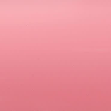 Smooth pink gradient wall (subtle horizontal texture) filling the frame; evenly lit, soft overhead light creates a lighter top and deeper pink bottom, with no other objects present.