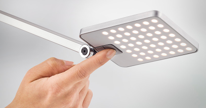 Attenzia dims with the touch of a butting and remembers your last setting.