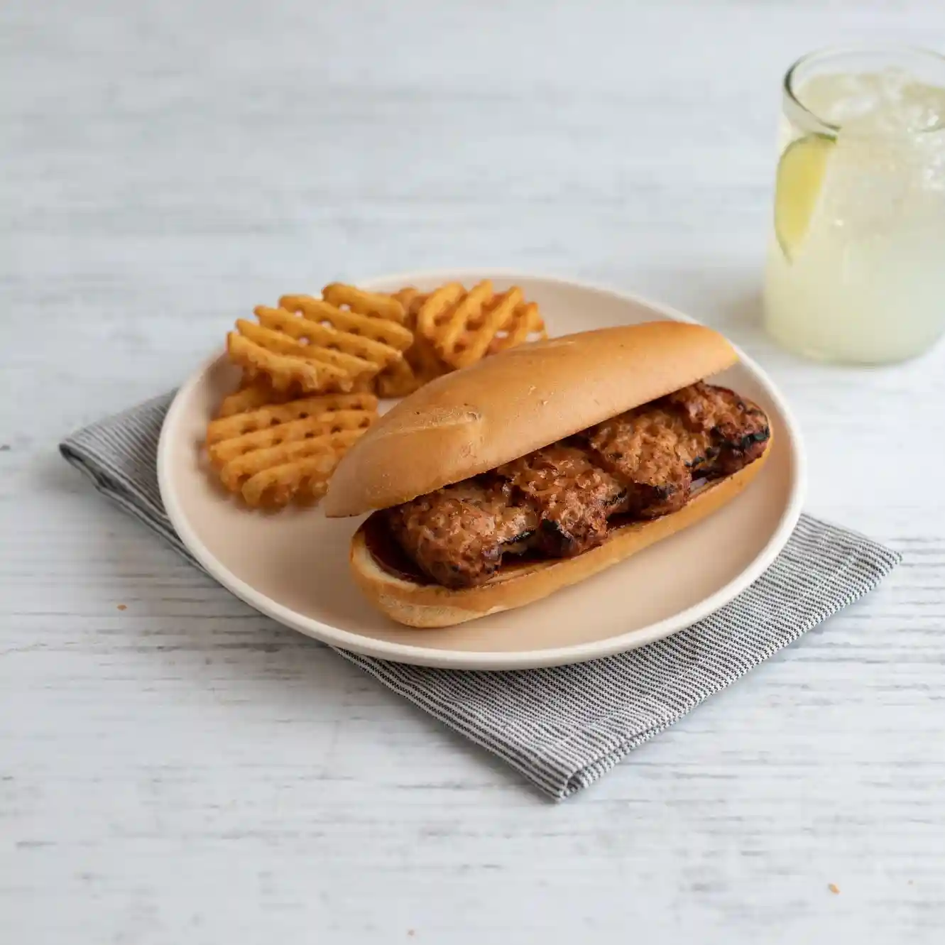 AdvancePierre™ Fully Cooked Flame Broiled Rib Shaped Pork Pattie, 3 oz.  https://images.salsify.com/image/upload/s--zMjMkl5l--/q_25/hkhd0by38r2tftuzywjo.webp