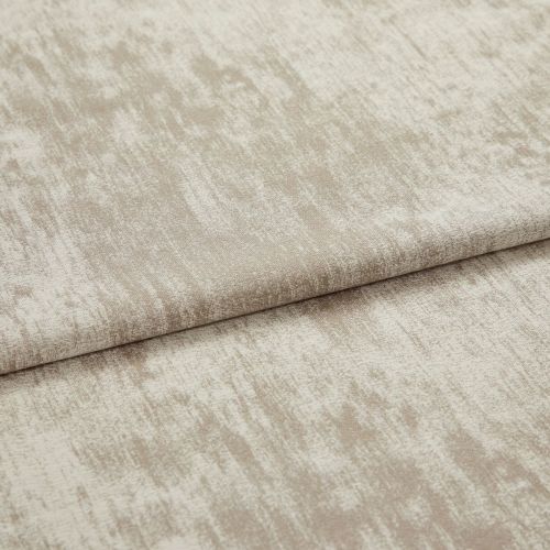 Folded beige velvet-look curtain fabric, horizontally creased and showing irregular brushed texture; displayed flat under soft, neutral studio lighting suggesting a fabric sample rather than a furnished room.
