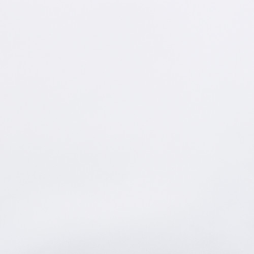 Unadorned white wall filling the frame, uniformly illuminated and featureless, creating a bright, minimal interior backdrop with soft, diffused lighting and no visible furniture or windows.