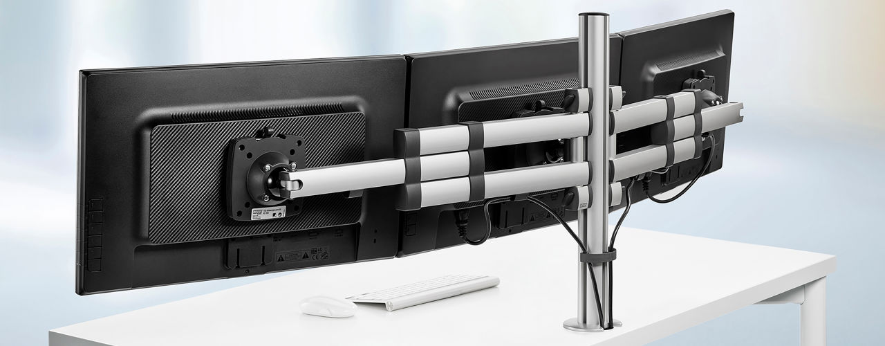 Novus offers several monitor arm options that fit in smaller workstations, cubicles, back-to-back, or against a wall.