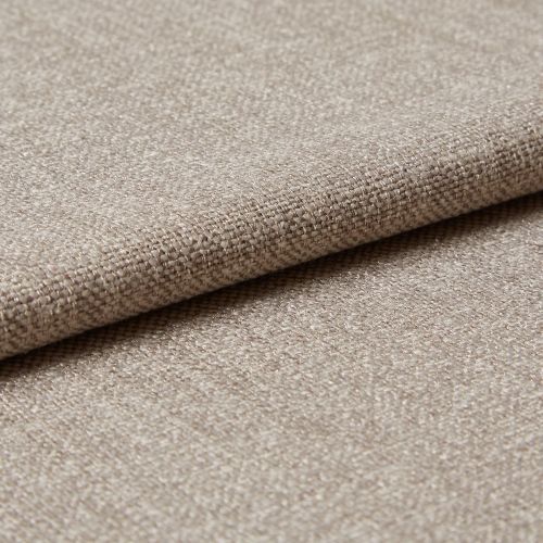 Beige woven upholstery fabric (tight basket weave), folded over an edge, displaying textured threads and slight sheen; close-up on a flat surface under soft, diffused lighting.