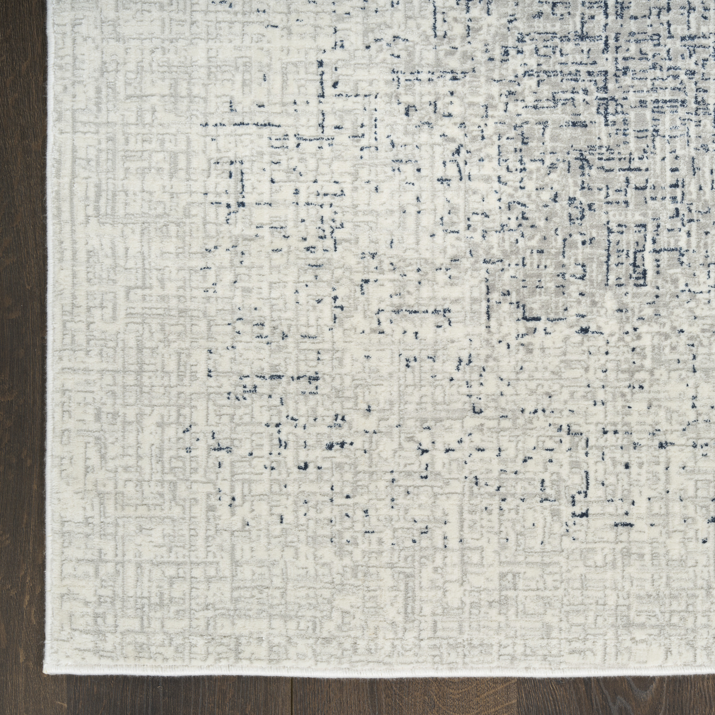 DKNY Grand Street 6' x 9' Ivory Blue Modern Indoor Rug